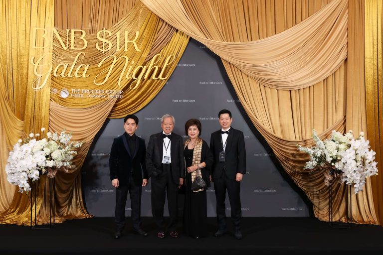 From left to right, Varit Bulakul, Chan Bulakul (Chairman of EXCO Committee), Vichada Bulakul, and Varut Bulakul (CEO of The Brooker Group PCL) at the BNB 1K Gala Night backdrop, hosted by The Brooker Group to celebrate reaching 1,000 BNB holdings.